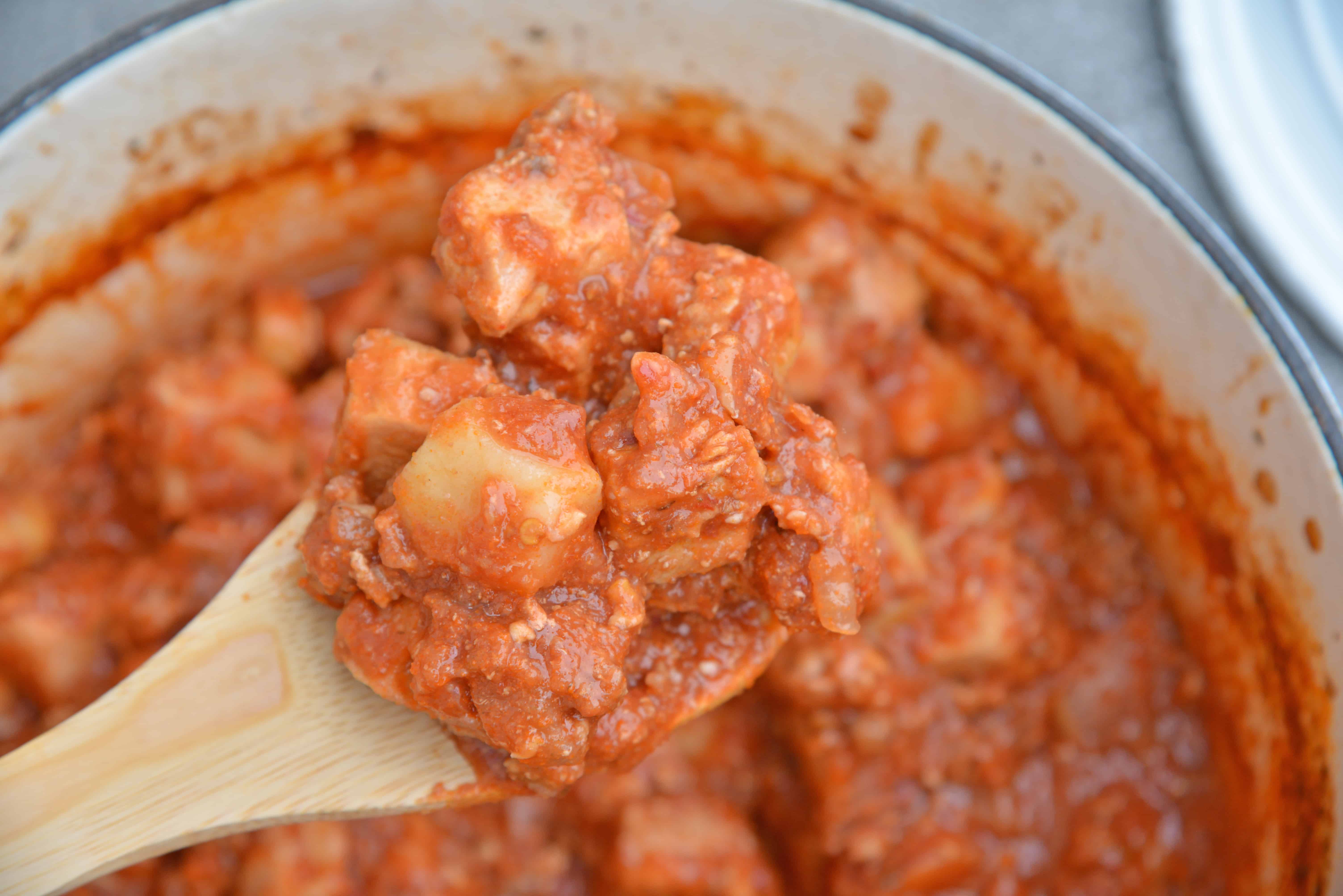 Spicy Pork and Potato Stew uses tender pork cuts and potato simmered in Middle Eastern spices and tomato sauce. Chipotle chiles in adobo sauce and chorizo bring loads of flavor. #porkstew #onepotmeals www.savoryexperiments.com 