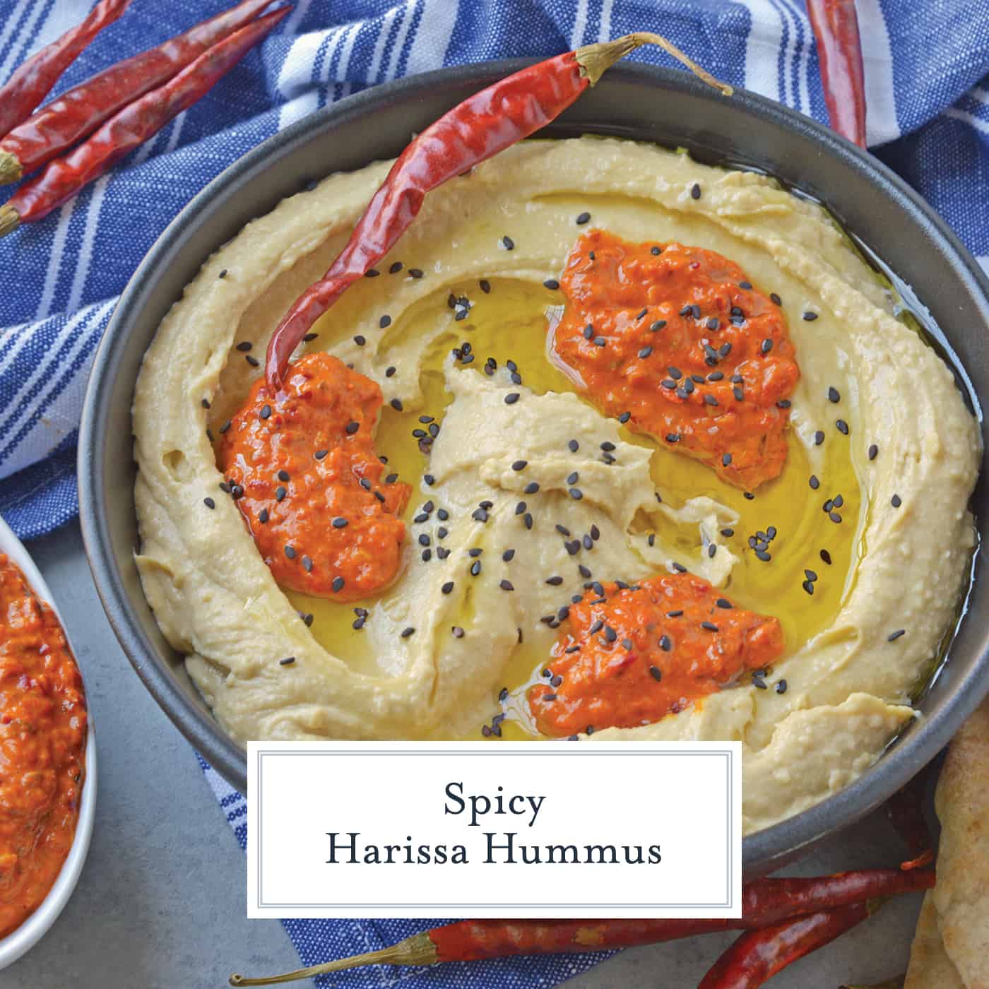 Harissa Hummus is an easy, packed full of flavor, homemade hummus recipe. Pair with vegetables or chips for a dip, or even as a spread on flatbreads or sandwiches! #spicyhummus #homemadehummusrecipe www.savoryexperiments.com