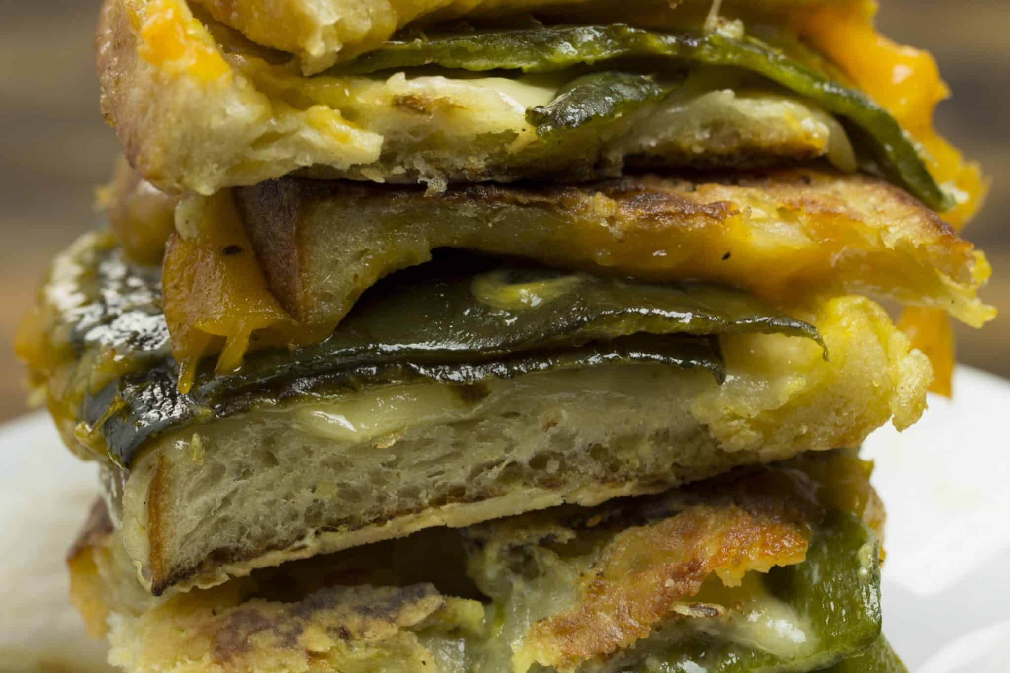 Chile Relleno Monte Cristo is a classic grilled cheese with pepper jack, cheddar and green chile and then battered and fried  Monte Cristo style. #montecristo #chilerelleno www.savoryexperiments.com 