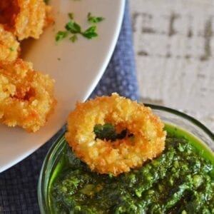 Authentic Chimichurri Sauce is easy to make and doubles as a marinade and sauce. Traditional chimichurri ingredients will flavor any dish! #chimichurrisauce www.savoryexperiments.com