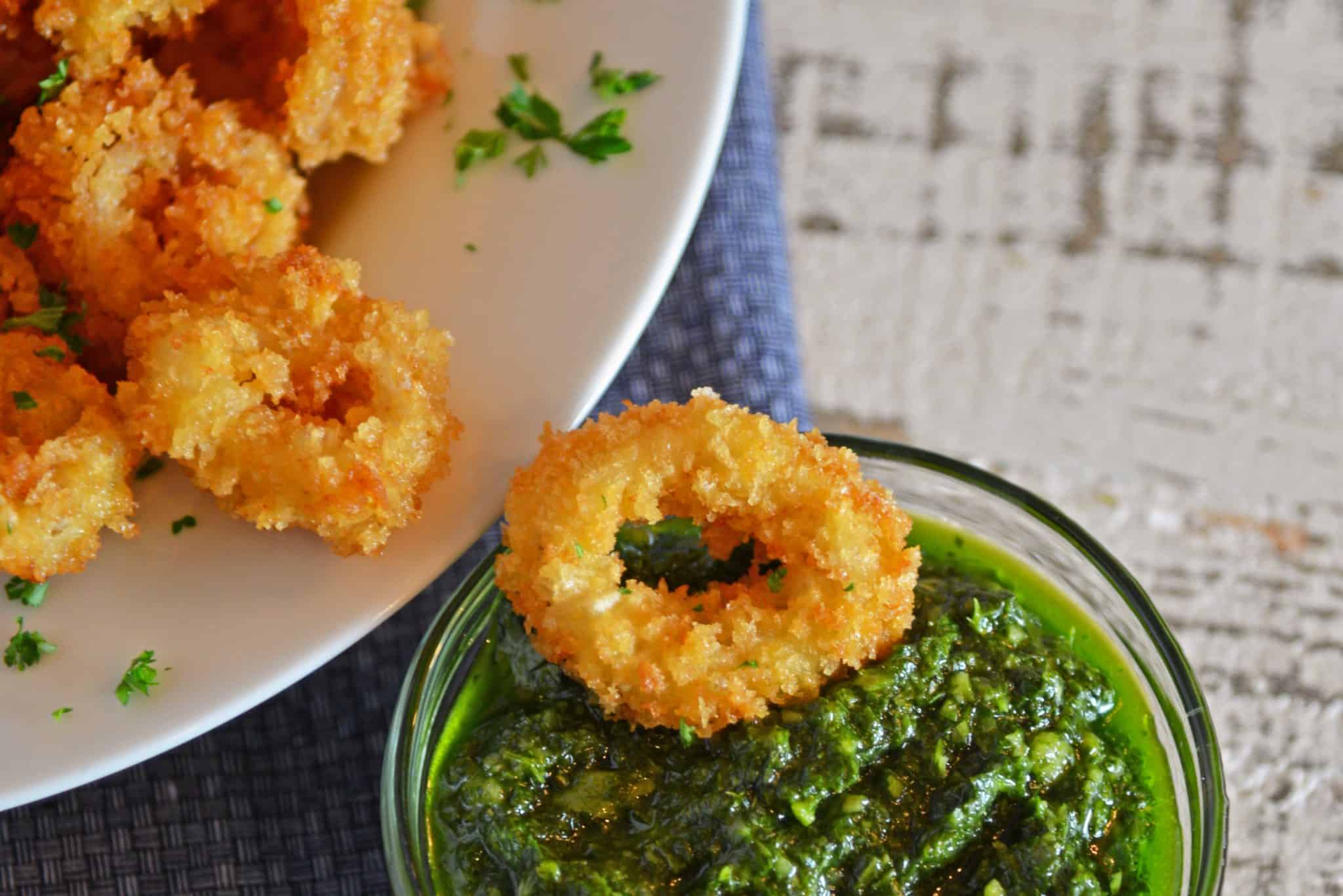 Authentic Chimichurri Sauce is easy to make and doubles as a marinade and sauce. Traditional chimichurri ingredients will flavor any dish! #chimichurrisauce www.savoryexperiments.com