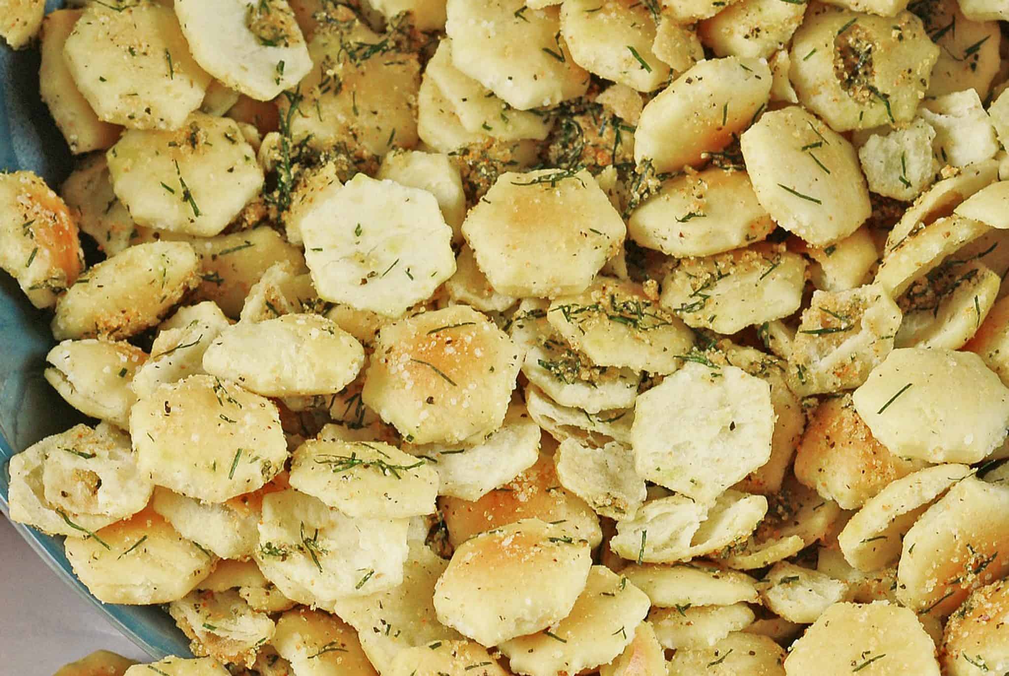 Dill Seasoned Oyster Crackers are the perfect snack, soup topper or salad crouton! They add an extra touch to any dish and are so easy to make and store! #dillseasonedoystercrackers #dilloystercrackers www.savoryexperiments.com