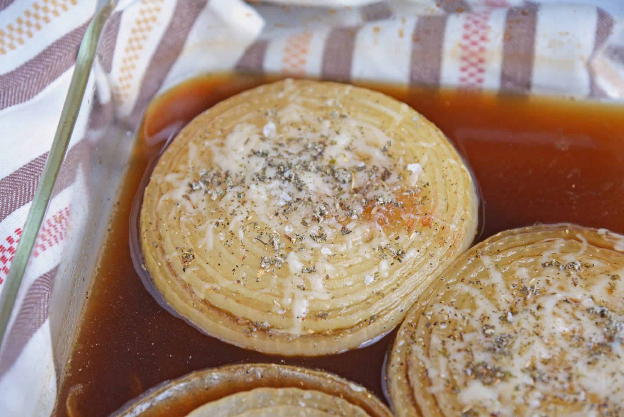 French Baked Onions are the perfect dish when you want french onion soup without the soup. A side dish recipe perfect for any meal.  #frenchonionsoup #bakedonions www.savoryexperiments.com