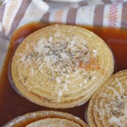 sliced onions with beef broth and sage