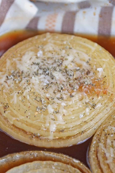 sliced onions with beef broth and sage