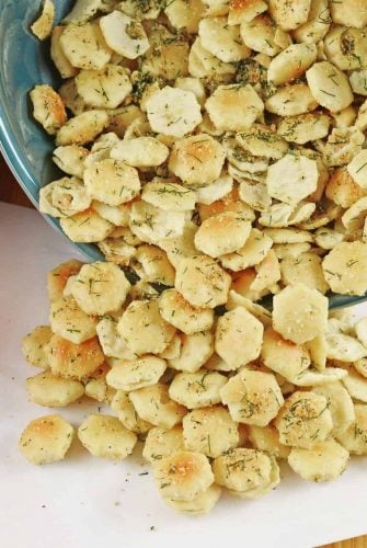 Dill Seasoned Oyster Crackers are the perfect snack, soup topper or salad crouton! They add an extra touch to any dish and are so easy to make and store! #dillseasonedoystercrackers #dilloystercrackers www.savoryexperiments.com