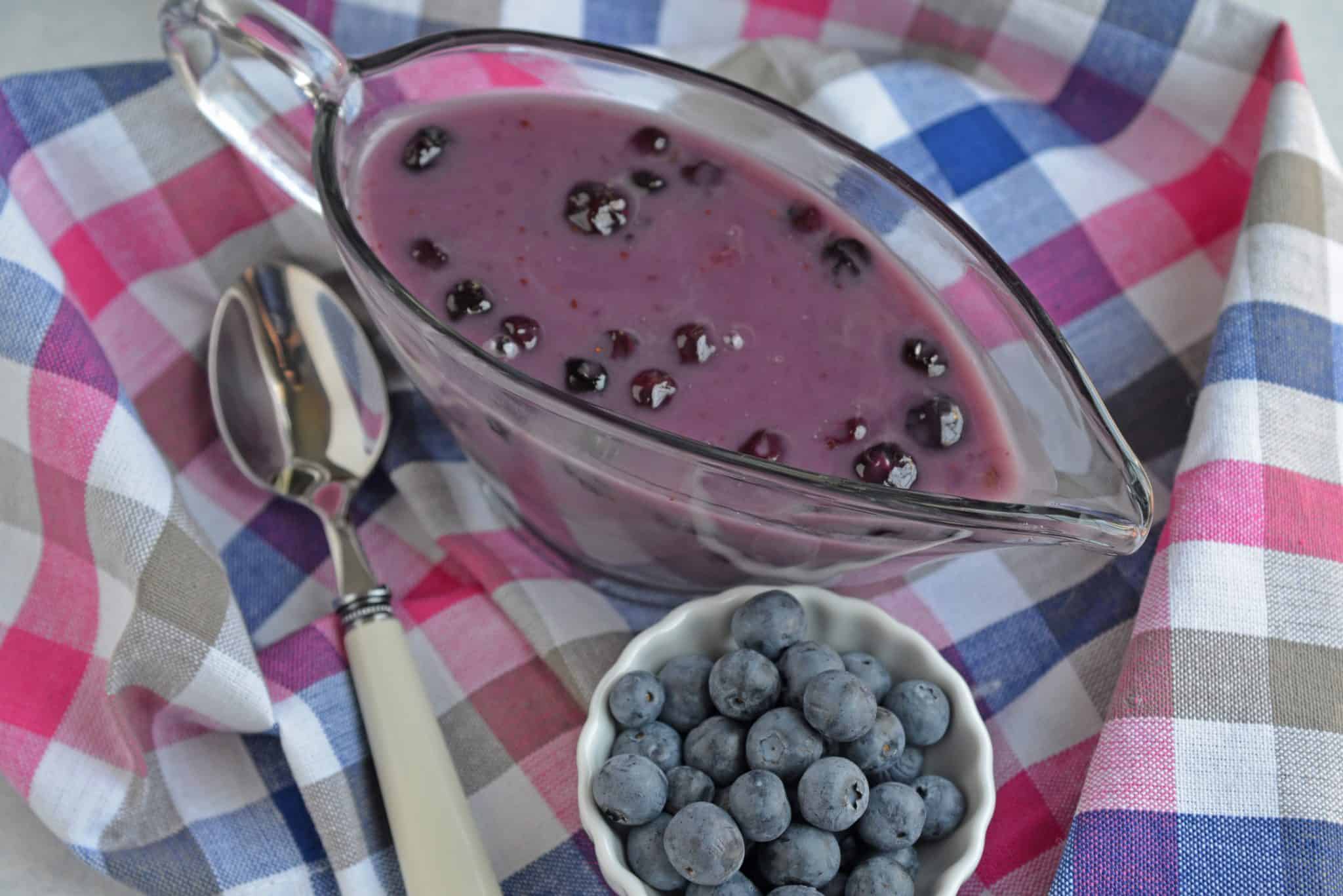 Homemade Blueberry Syrup is the perfect quick blueberry pancake syrup for pancakes and waffles. Uses a blueberry compote and comes together in 30 minutes! #blueberrysyrup #blueberrypancakesyrup www.savoryexperiments.com