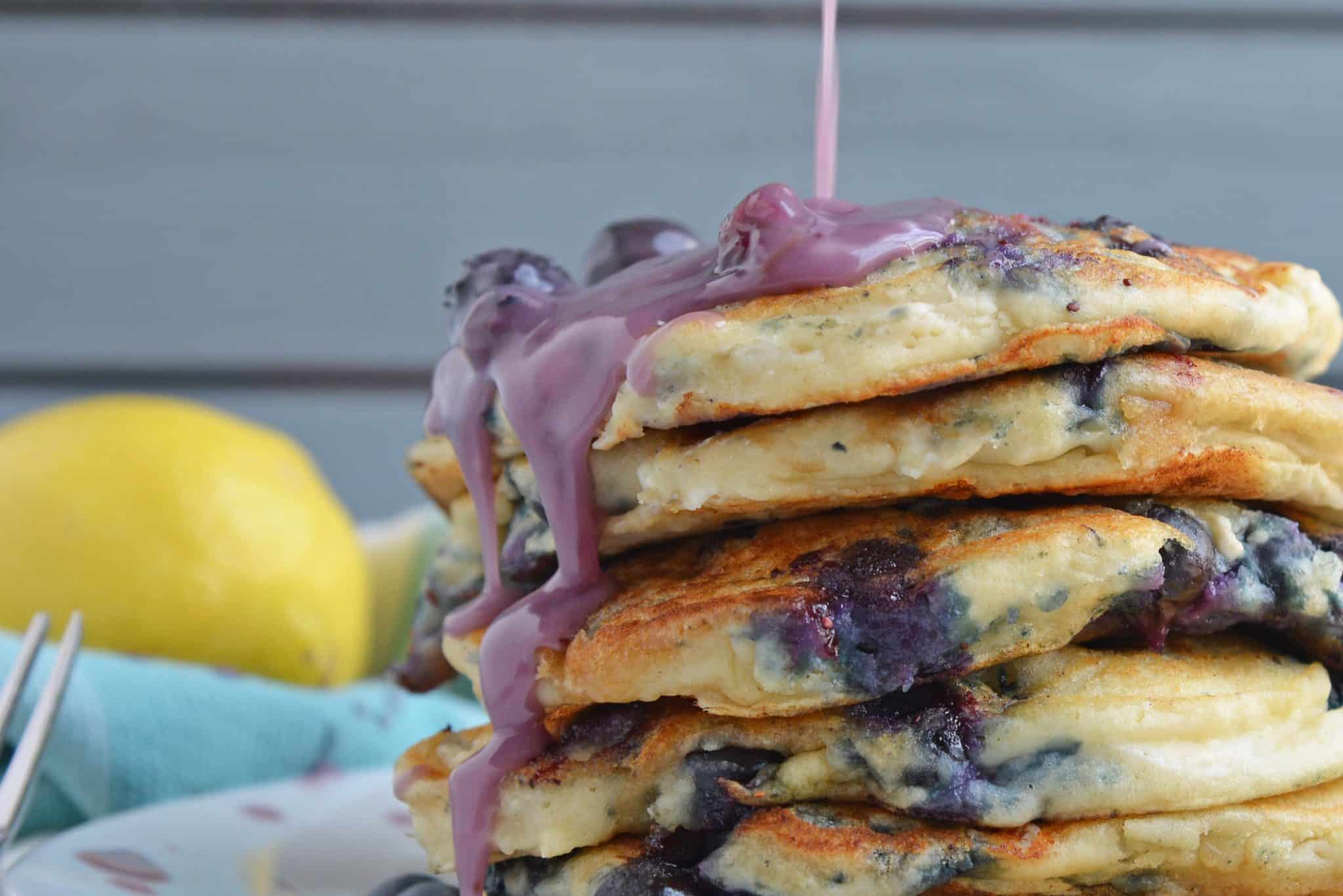 Homemade Blueberry Syrup is the perfect quick blueberry pancake syrup for pancakes and waffles. Uses a blueberry compote and comes together in 30 minutes! #blueberrysyrup #blueberrypancakesyrup www.savoryexperiments.com