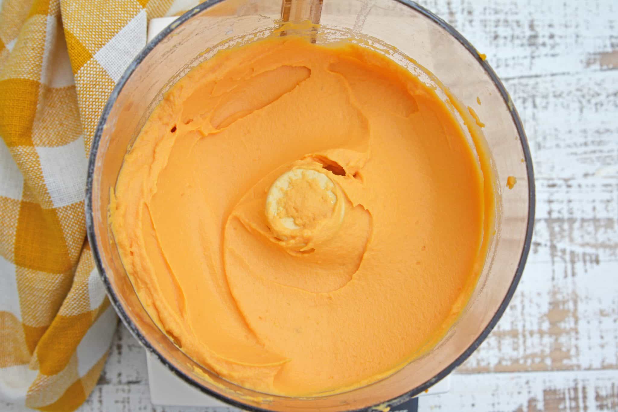 This Mashed Sweet Potatoes recipe uses baked sweet potatoes with natural sugars, bay leaf infused cream and a spike of orange juice for the best sweet potato mash ever! #sweetpotatomash #mashedsweetpotatoes www.savoryexperiments.com