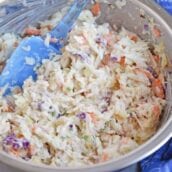 Yogurt Pineapple Coleslaw is a delicious homemade coleslaw that you can have ready in just 10 minutes! It has a yummy sweet and spicy flavor profile to it! #pineapplecoleslaw #nomayocoleslaw #healthycoleslawrecipe www.savoryexperiments.com