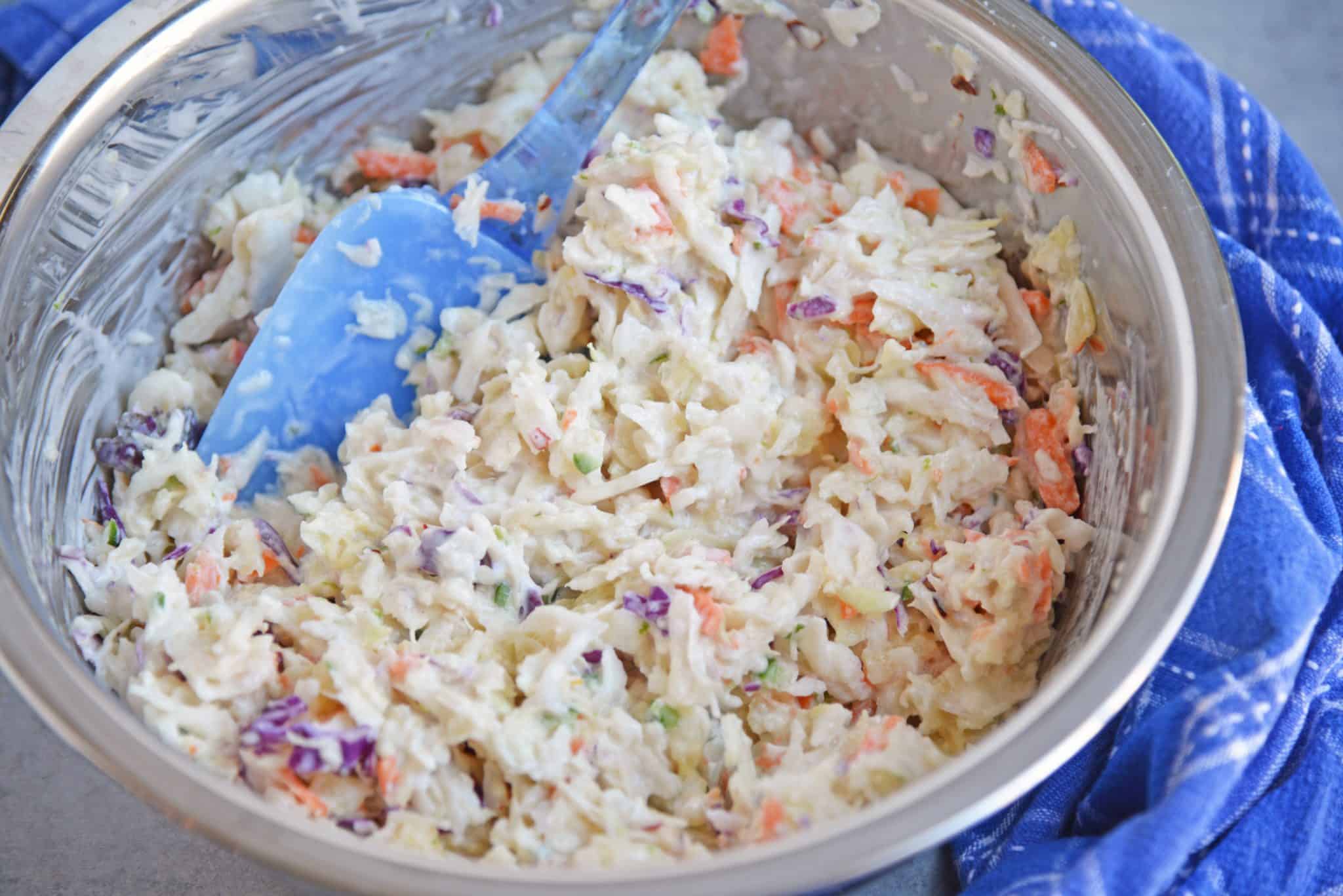 Yogurt Pineapple Coleslaw is a delicious homemade coleslaw that you can have ready in just 10 minutes! It has a yummy sweet and spicy flavor profile to it! #pineapplecoleslaw #nomayocoleslaw #healthycoleslawrecipe www.savoryexperiments.com