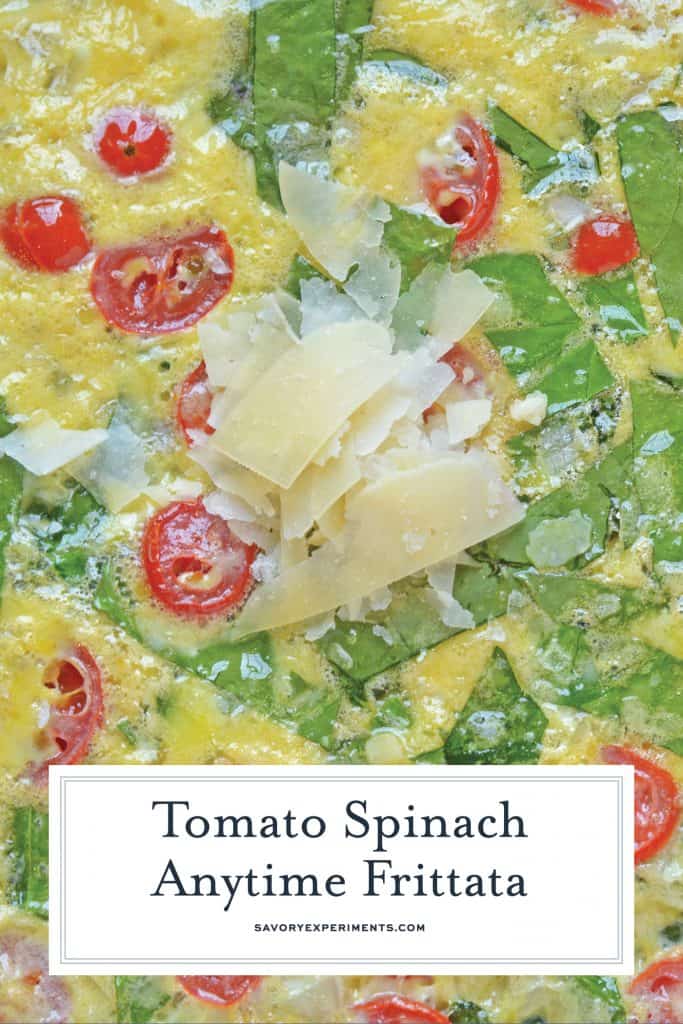 This Tomato Spinach Frittata recipe is excellent for breakfast or brunch, packed full of delicious flavors from tomatoes, spinach, shallots, and parmesan cheese! #spinachfrittata #breakfastfrittatarecipe www.savoryexperiments.com