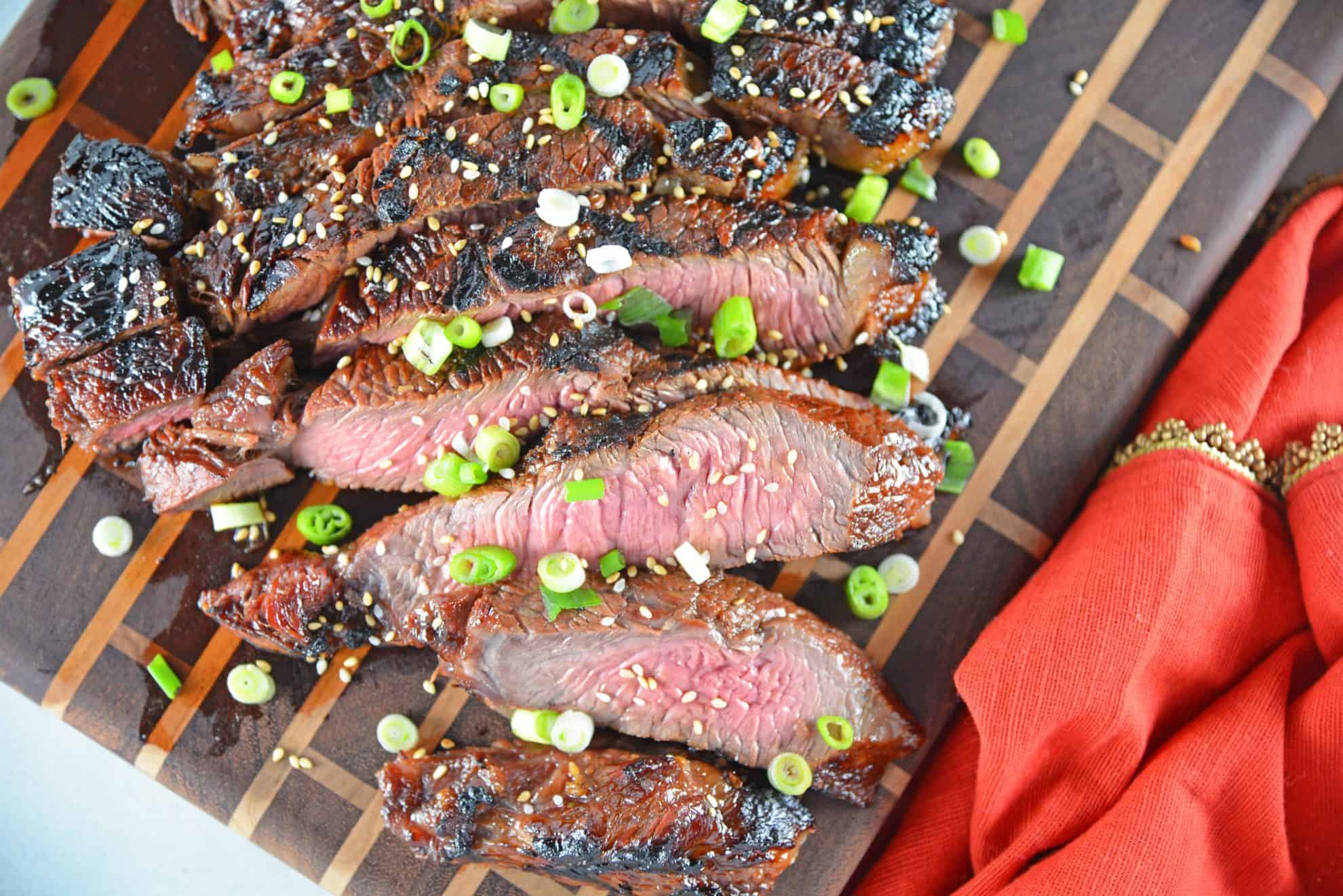 Asian BBQ Steak marinade can be used on any cut of beef, combining traditional Asian flavors like soy sauce, honey, ginger, sesame and garlic. #steakmarinade #bbqsteak #beefrecipe www.savoryexperiments.com 
