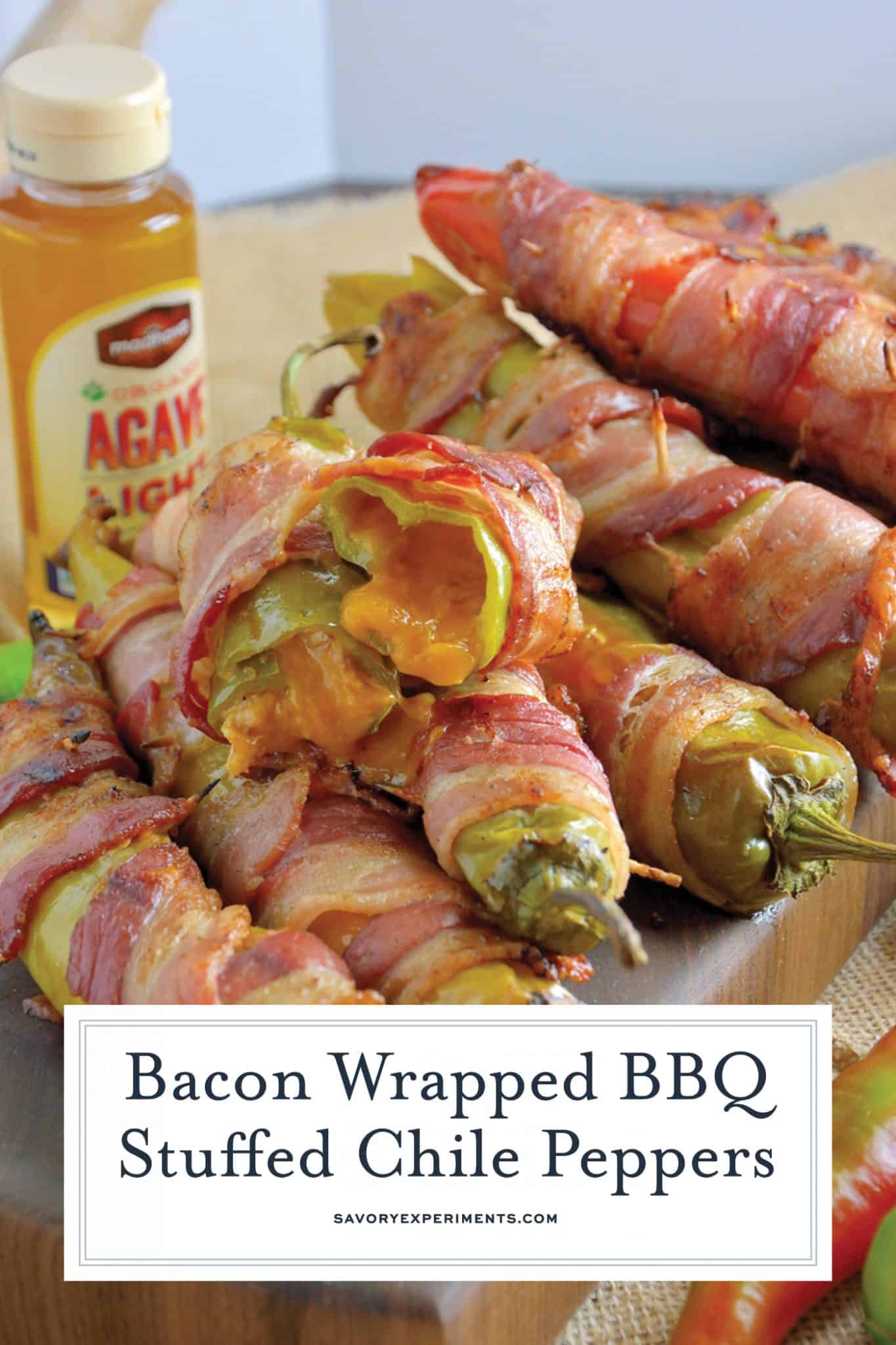 Bacon Wrapped BBQ Chicken Stuffed Chile Peppers are the ultimate BBQ Chicken recipe. Tender shredded chicken stuff in a chile pepper, wrapped in bacon and drizzled with sweet agave nectar. #BBQchicken #stuffedchilepeppers www.savoryexperiments.com