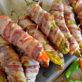 Bacon Wrapped BBQ Chicken Stuffed Chile Peppers Recipe- shredded chicken tossed in your choice of BBQ sauce and sharp cheddar cheese, stuffed into a large chile, wrapped in bacon and slow grilled. As seen on Fox News!