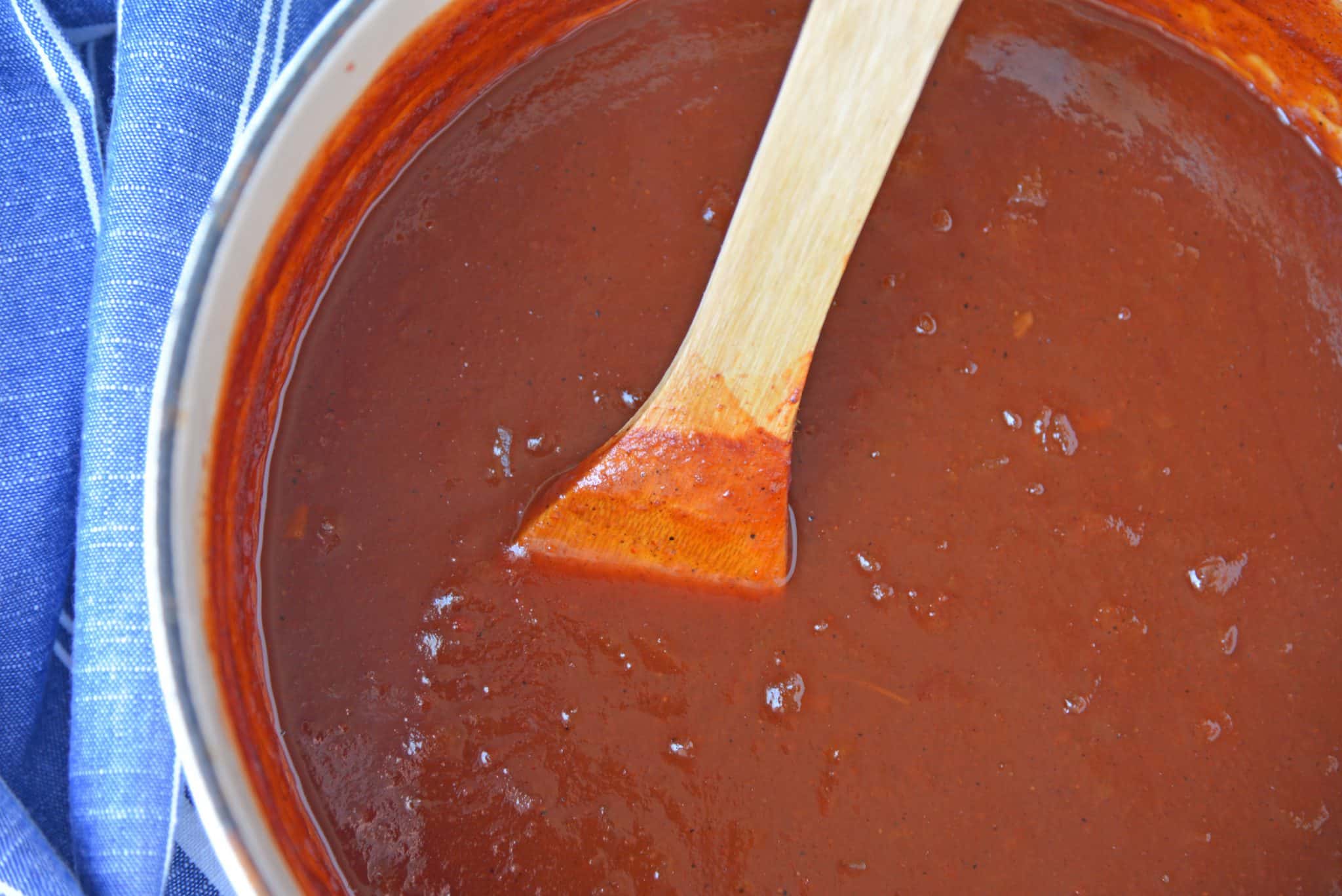 Homemade BBQ Sauce is an easy recipe that you can make at home! All you need is some ketchup, onion, lemon juice, Worcestershire sauce, vinegar, and spices! #BBQsauce #homemadeBBQsauce #bestBBQsaucerecipe www.savoryexperiments.com