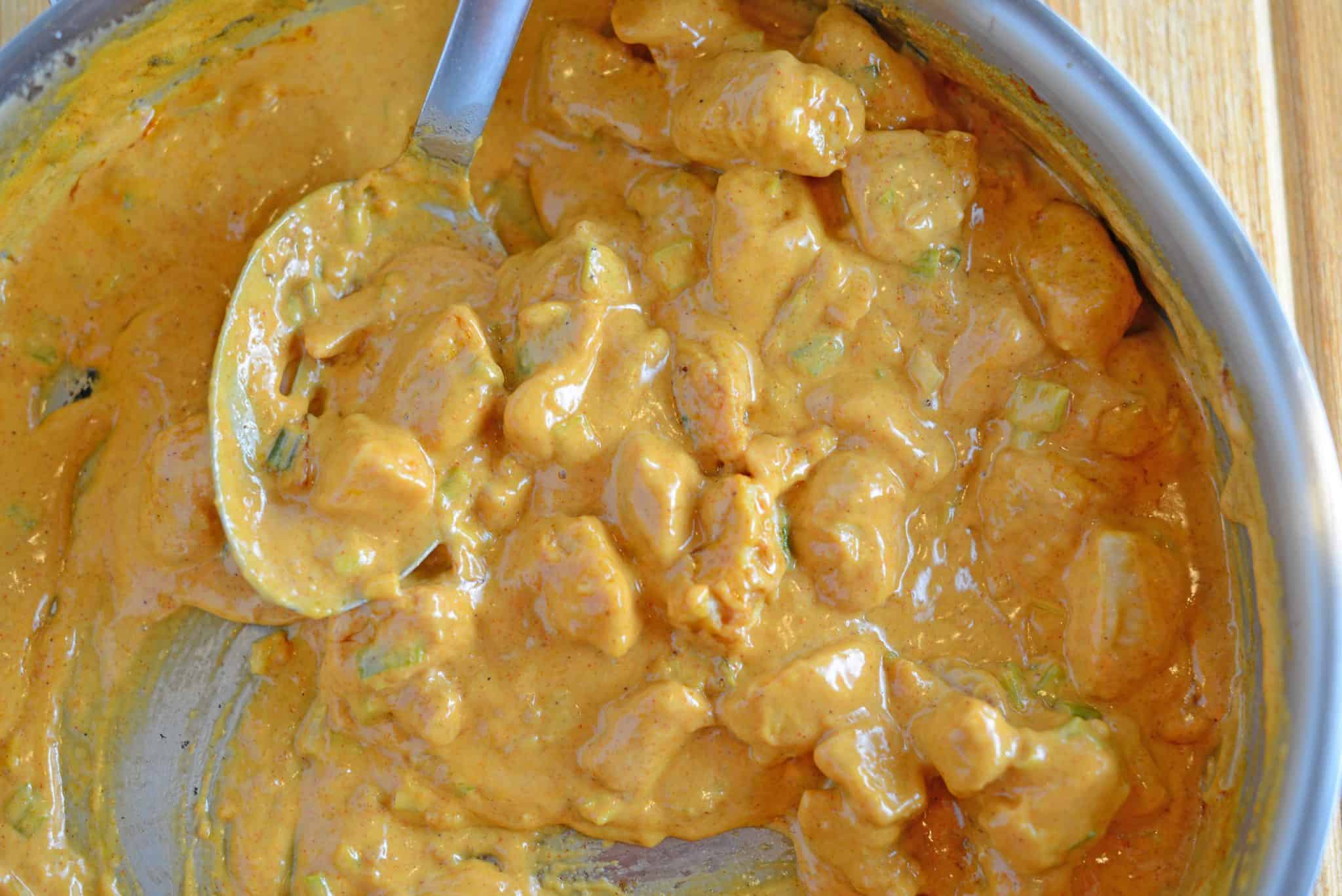 Creamy Paprika Chicken is a flavorful and easy family dinner. Crispy chicken in a creamy paprika sauce with garlic and scallions. #easychickenrecipes #paprikachicken www.savoryexperiments.com