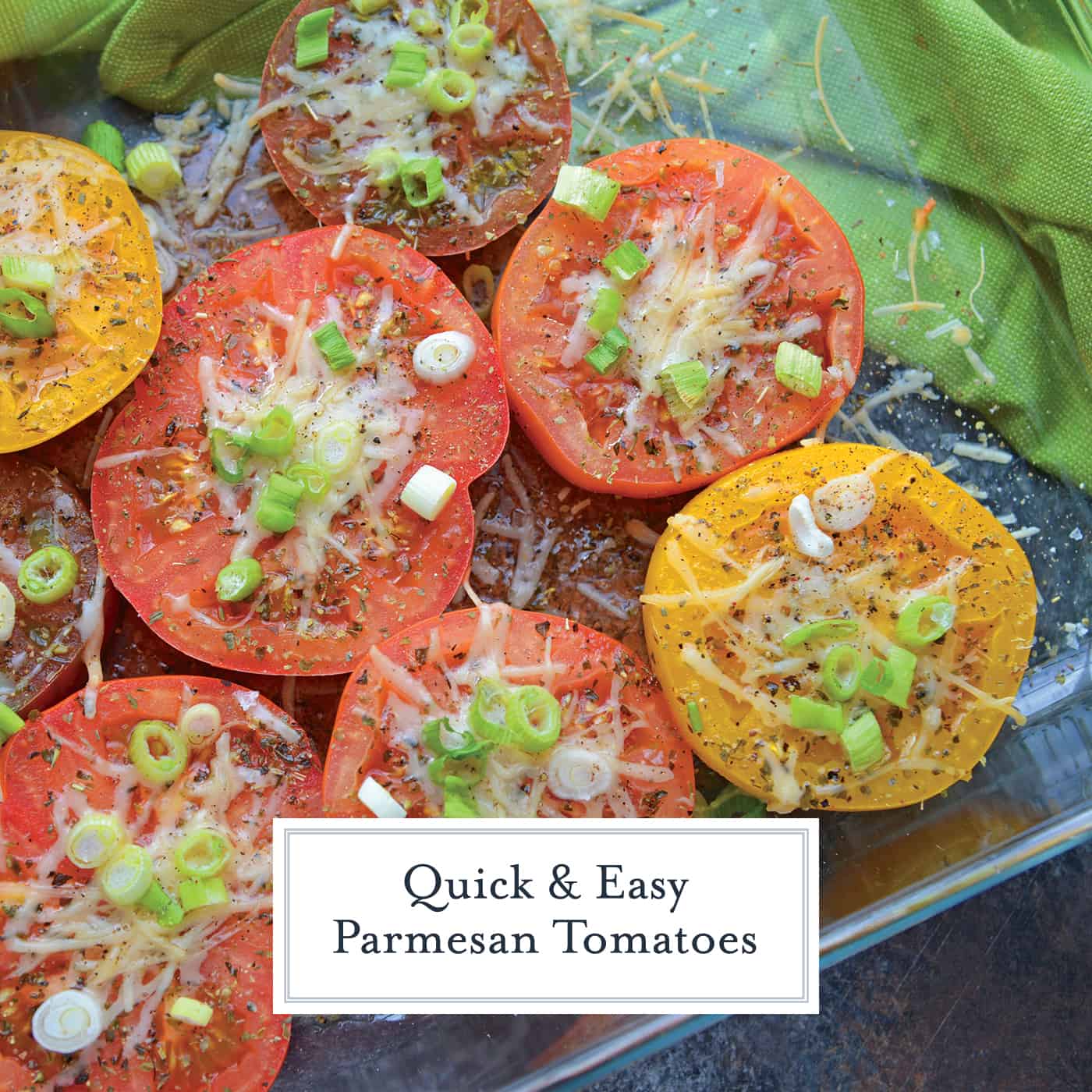 Parmesan Tomatoes are whole tomatoes, cut in half and baked with Parmesan cheese, Italian seasoning and garnished with lush scallions. An easy side dish recipe for any meal!  #tomatosidedishrecipes www.savoryexperiments.com 