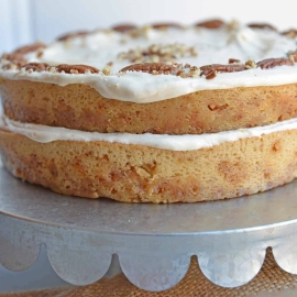 Brown Butter Caramel Cake is a two layer naked cake made with toffee bits and salted caramel frosting. 
