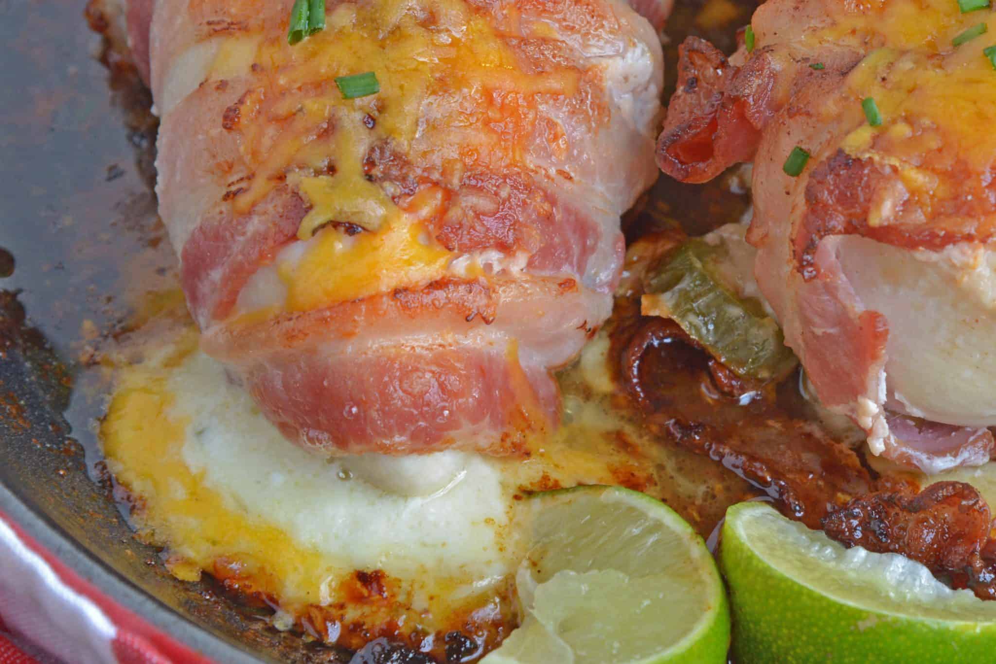 Jalapeno Bacon Wrapped Chicken is a cheese stuffed chicken breast recipe using three cheeses and fresh jalapenos. Avocado and lime cool off the hot flavors. #baconwrappedchicken #jalapenopopperchicken www.savoryexperiments.com