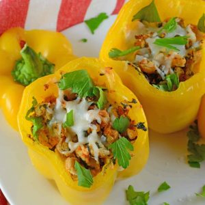 Turkey Stuffed Peppers are filled with spinach, onion, garlic, white beans and cheese. An easy and healthy dinner idea.