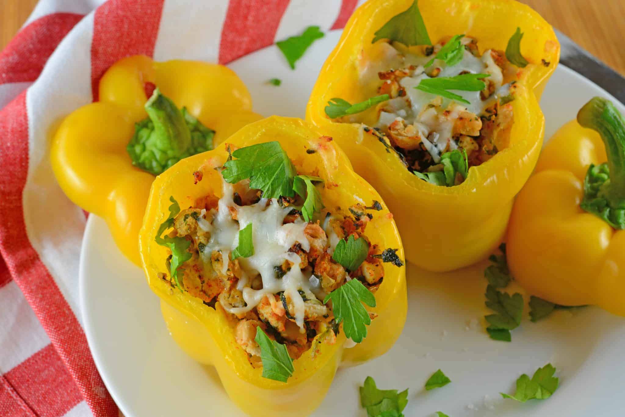 Turkey Stuffed Peppers are filled with spinach, onion, garlic, white beans and cheese. An easy and healthy dinner idea.