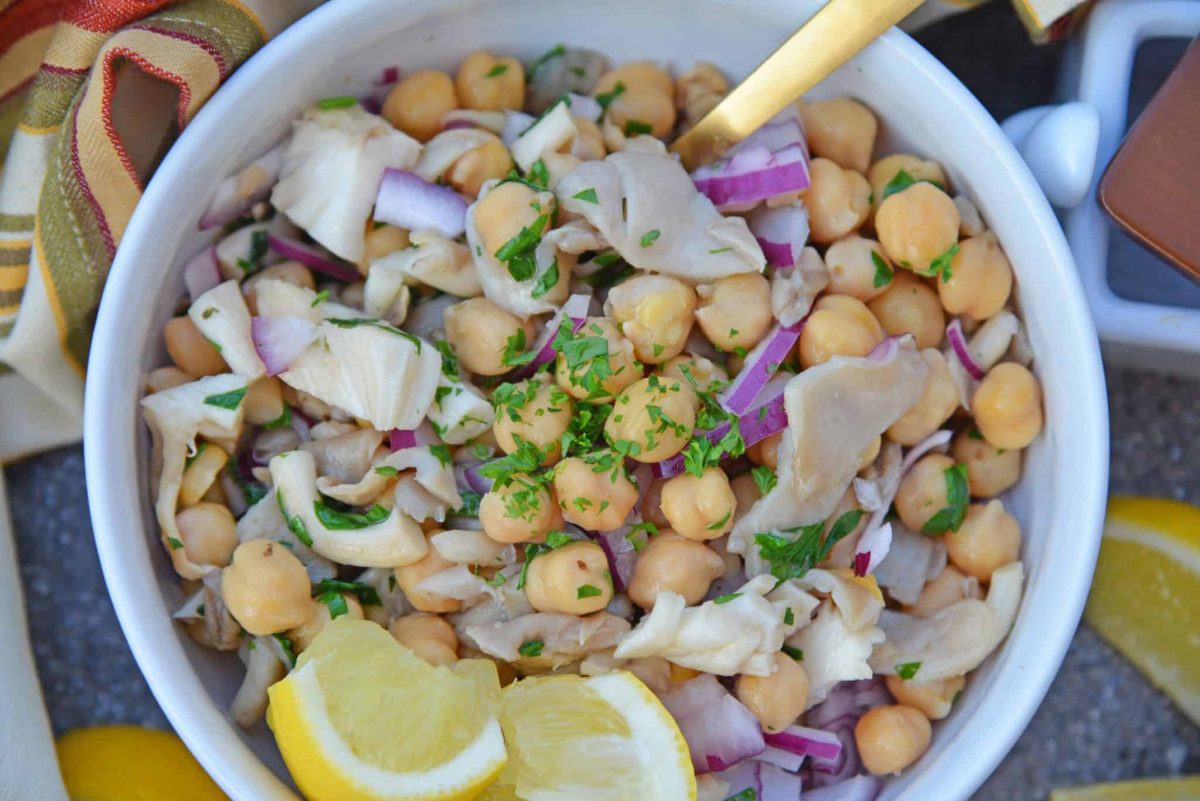 This Chickpea Salad is full of flavor from mushrooms, lemon and truffle oil. The perfect side dish for any meal and ready in only 20 minutes! #chickpeasalad #chickpearecipes www.savoryexperiments.com