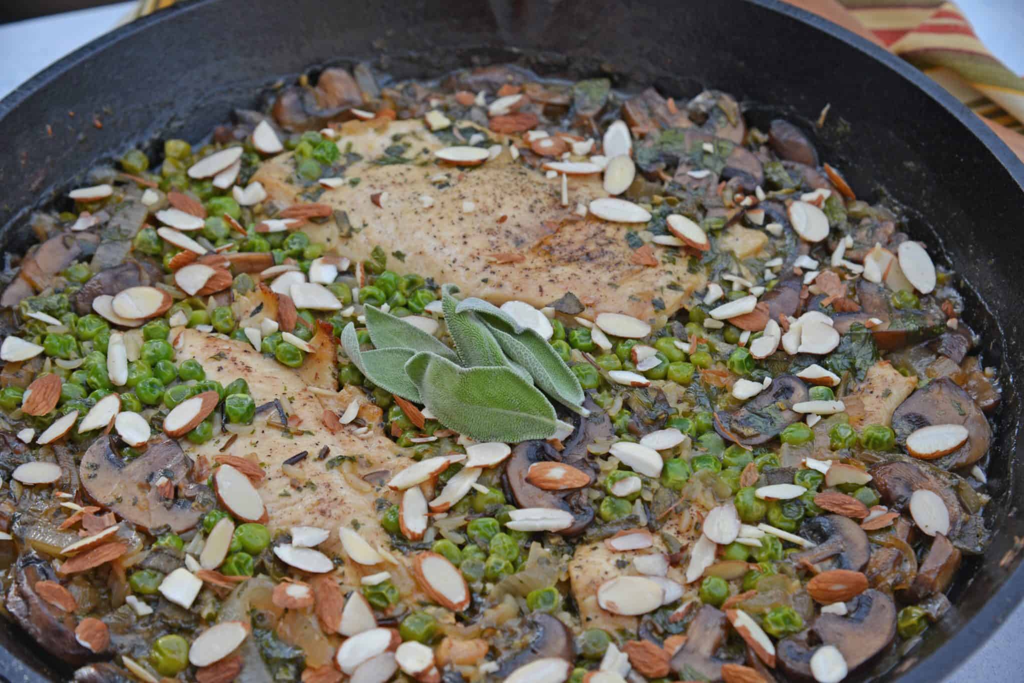 Mushroom Chicken and Rice Skillet is an easy one dish meal with loads of flavor like peas, mushrooms, shallots, sage and garlic. 