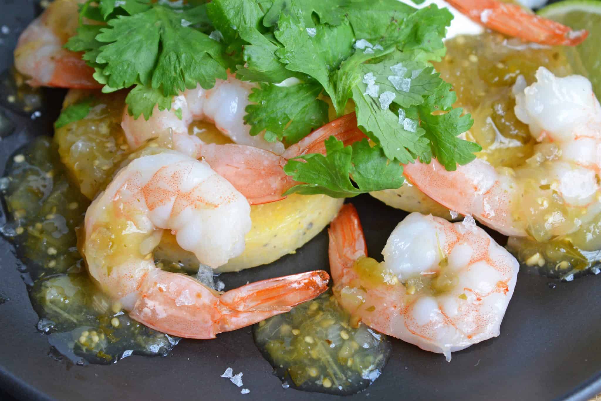 This Salsa Verde Shrimp recipe is a delicious meal or appetizer using fresh lime, tomatillos, jalapenos and spices. Easy to make and delicious to eat. #easyshrimprecipes #shrimpdinnerrecipes www.savoryexperiments.com