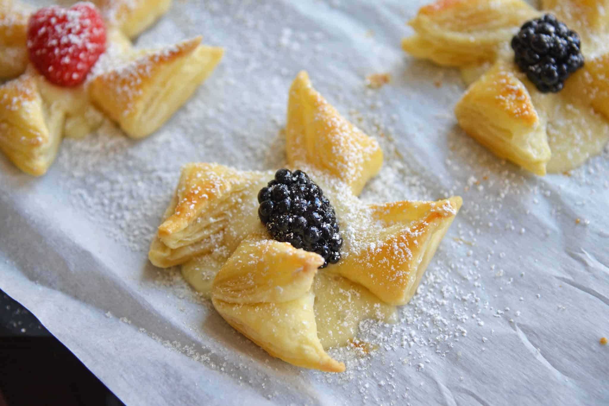 Danish Pastry make a great dessert that is not heavy but is also easy and quick to put together. Everyone will love this brie in puff pastry! #puffpastrydesserts #brieinpuffpastry www.savoryexperiments.com