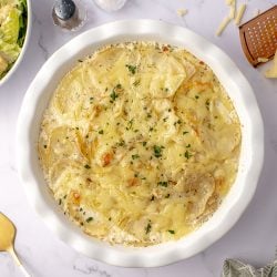 overhead of herbed potato galette in a round serving dish