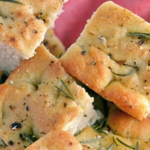 Thick and Chewy Focaccia Bread is a delicious focaccia bread recipe topped with sea salt and fresh herbs, paired with Italian bread dip, it is sure to please! #fococciabread #fococciabreadrecipe #whatisfocaccia www.savoryexperiments.com