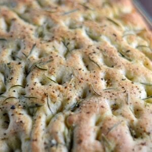 Thick and Chewy Focaccia Bread - a super easy for the perfect focaccia bread topped with sea salt and herbs.