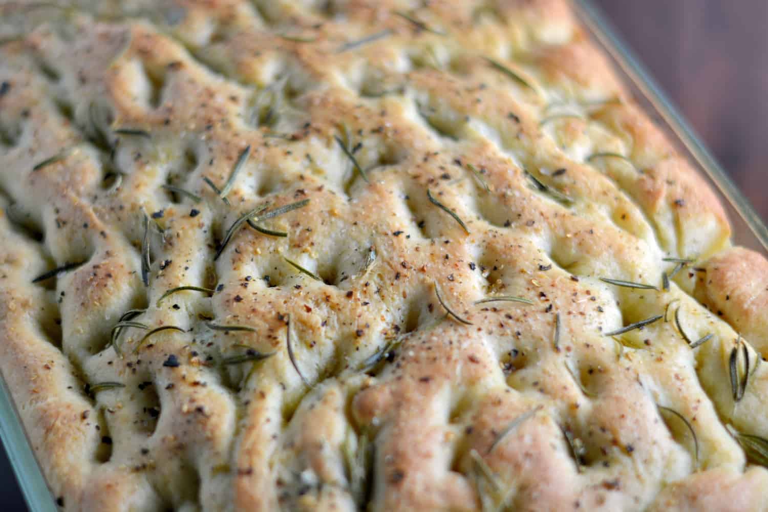 Thick and Chewy Focaccia Bread - a super easy for the perfect focaccia bread topped with sea salt and herbs.