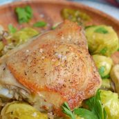 Chicken Dijon is an easy dinner recipe using chicken thighs, mushrooms, brussels sprouts, sweet onions, apple juice and of course, Dijon mustard! #chickendijon #mustardchicken #easychickenrecipe www.savoryexperiments.com