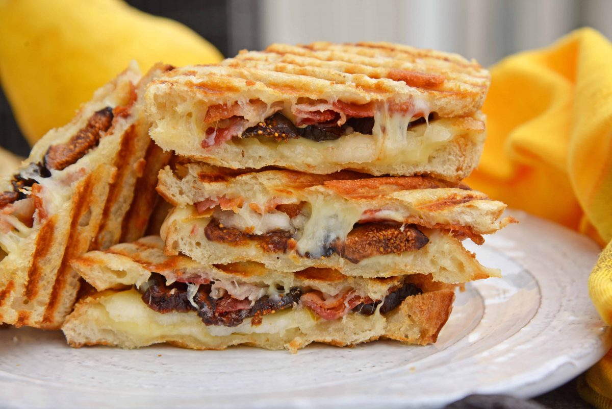 This Bacon, Pear and Fig Grilled Cheese combines sweet, savory and gooey. The ultimate grilled cheese! #gourmetgrilledcheese www.savoryexperiments.com