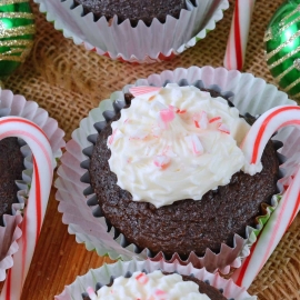 Peppermint Mocha Cupcakes use doctored up box mix, marshmallow creme frosting and candy canes for the ultimate kid-friendly cupcake recipe! #mochacupcakes #christmascupcakes www.savoryexperiments.com