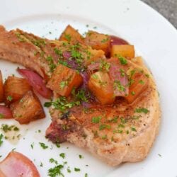 Pineapple Balsamic Pork Chops are a quick and easy meal that combine sweet balsamic vinegar and pineapple with garlic and onions for a well-balanced and easy meal! #porkchoprecipes #balsamicporkchops www.savoryexperiments.com