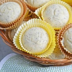 Lemon Poppy Seed Muffins are a quick and easy muffin recipe that can be made in 30 minutes. Carbonated lemon water is the secret ingredient to make them super fluffy! #lemonmuffins #lemonpoppyseedmuffinsrecipe www.savoryexperiments.com