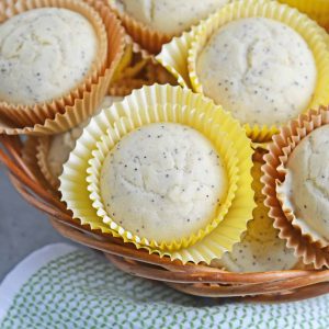 Lemon Poppy Seed Muffins are a quick and easy muffin recipe that can be made in 30 minutes. Carbonated lemon water is the secret ingredient to make them super fluffy! #lemonmuffins #lemonpoppyseedmuffinsrecipe www.savoryexperiments.com