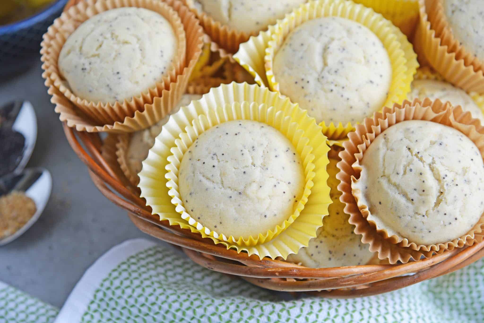 Lemon Poppy Seed Muffins are a quick and easy muffin recipe that can be made in 30 minutes. Carbonated lemon water is the secret ingredient to make them super fluffy! #lemonmuffins #lemonpoppyseedmuffinsrecipe www.savoryexperiments.com