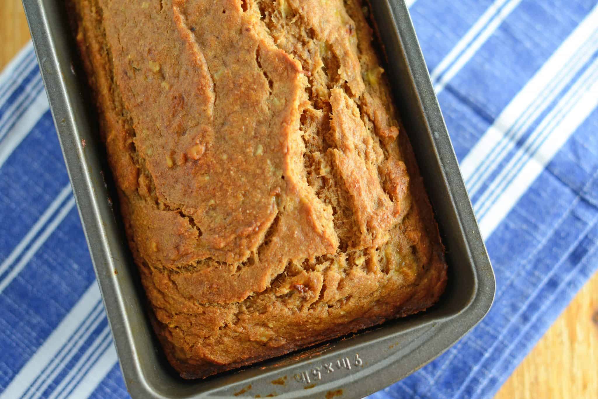 Whole Wheat Banana Bread is a healthier version of regular banana bread! Add pecans or walnuts for even more flavor! #wholewheatbananabread #bananabreadrecipe #bestbananabread www.savoryexperiments.com