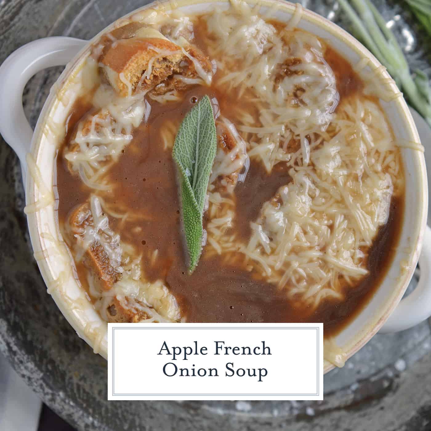 Apple French Onion Soup combines a robust French Onion Soup Recipe using sweet apples for flavor and texture. Top with crunchy garlic croutons and gooey cheese. #frenchonionsoup #fallsoup www.savoryexperiments.com
