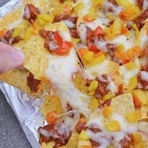 bbq chicken nachos on a baking sheet