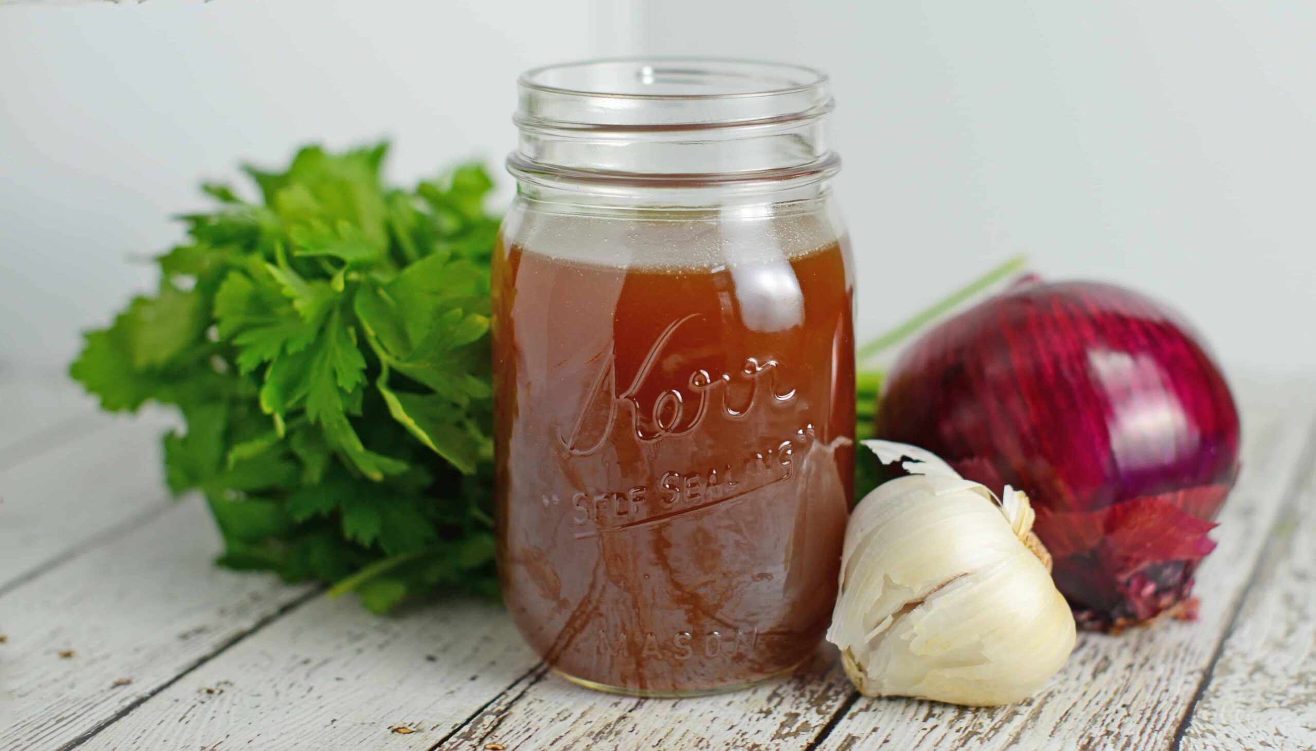 Homemade Beef Stock Recipe - A delicious and nutritious real food kitchen staple. www.savoryexperiments.com