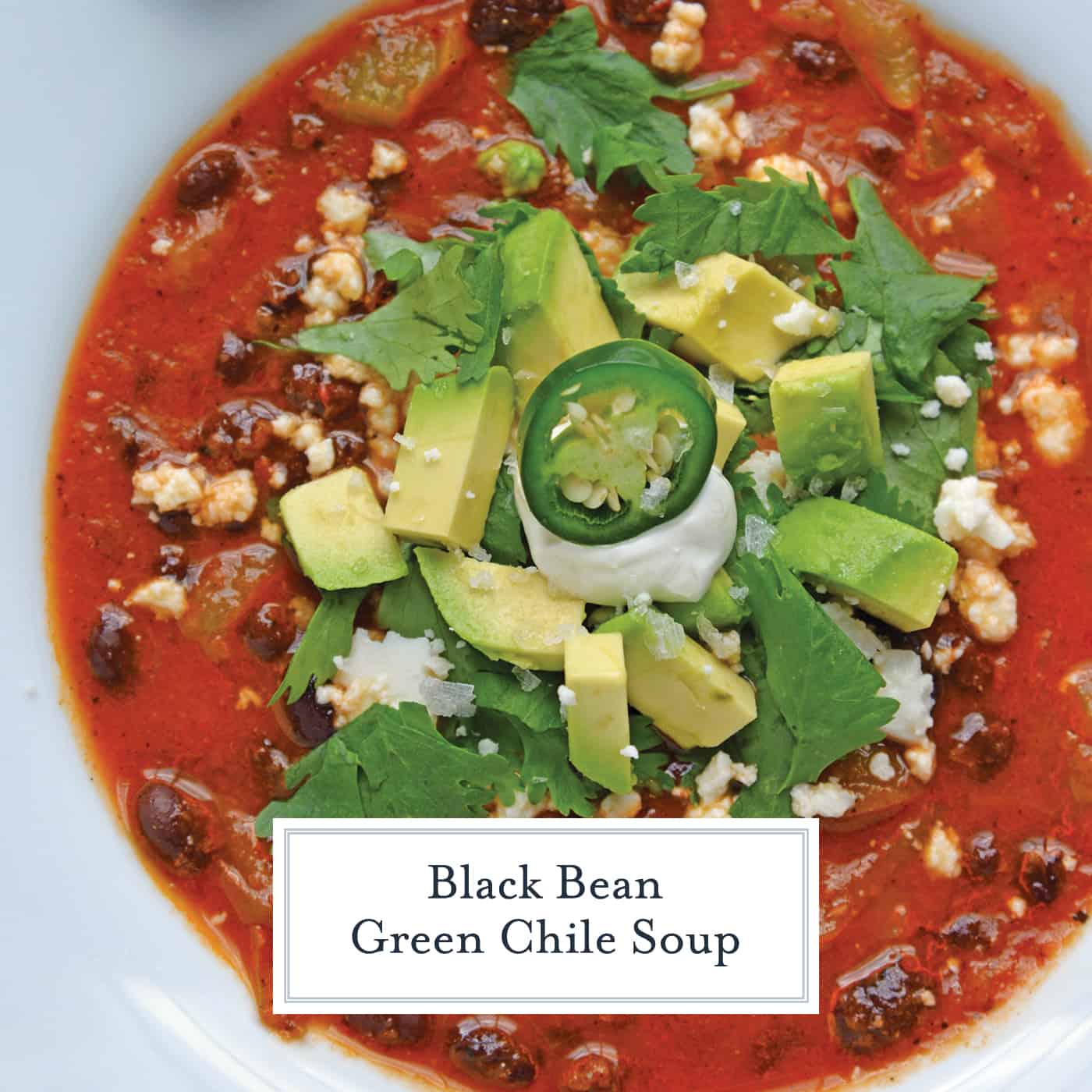Black bean green chile soup is a tomato based soup with smoky chipotle peppers and robust flavors. Top with avocado, cilantro and queso fresco! #easysoups #souprecipes www.savoryexperiments.com 