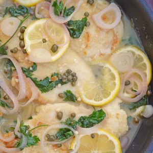 Classic Chicken Piccata is an easy Italian recipe that comes together in less than 3o minutes and explodes with flavors of lemon, caper and shallot. Delicious! #chickenpiccata #easyitalianrecipes www.savoryexperiments.com