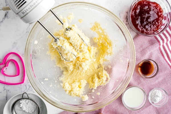 cookie dough in a glass mixing bowl