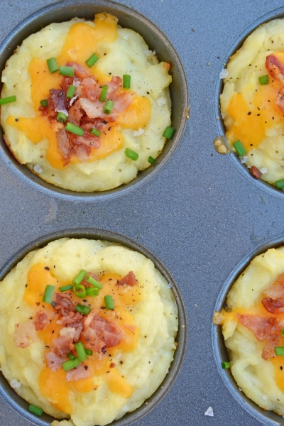 Loaded Mashed Potato Cups are the best way to use leftover mashed potatoes. Mixed with cheese, eggs and a few other ingredients, you load them into a muffin tin and poof, you've got finger food mashed potatoes! #mashedpotatoes #mashedpotatocups www.savoryexperiments.com