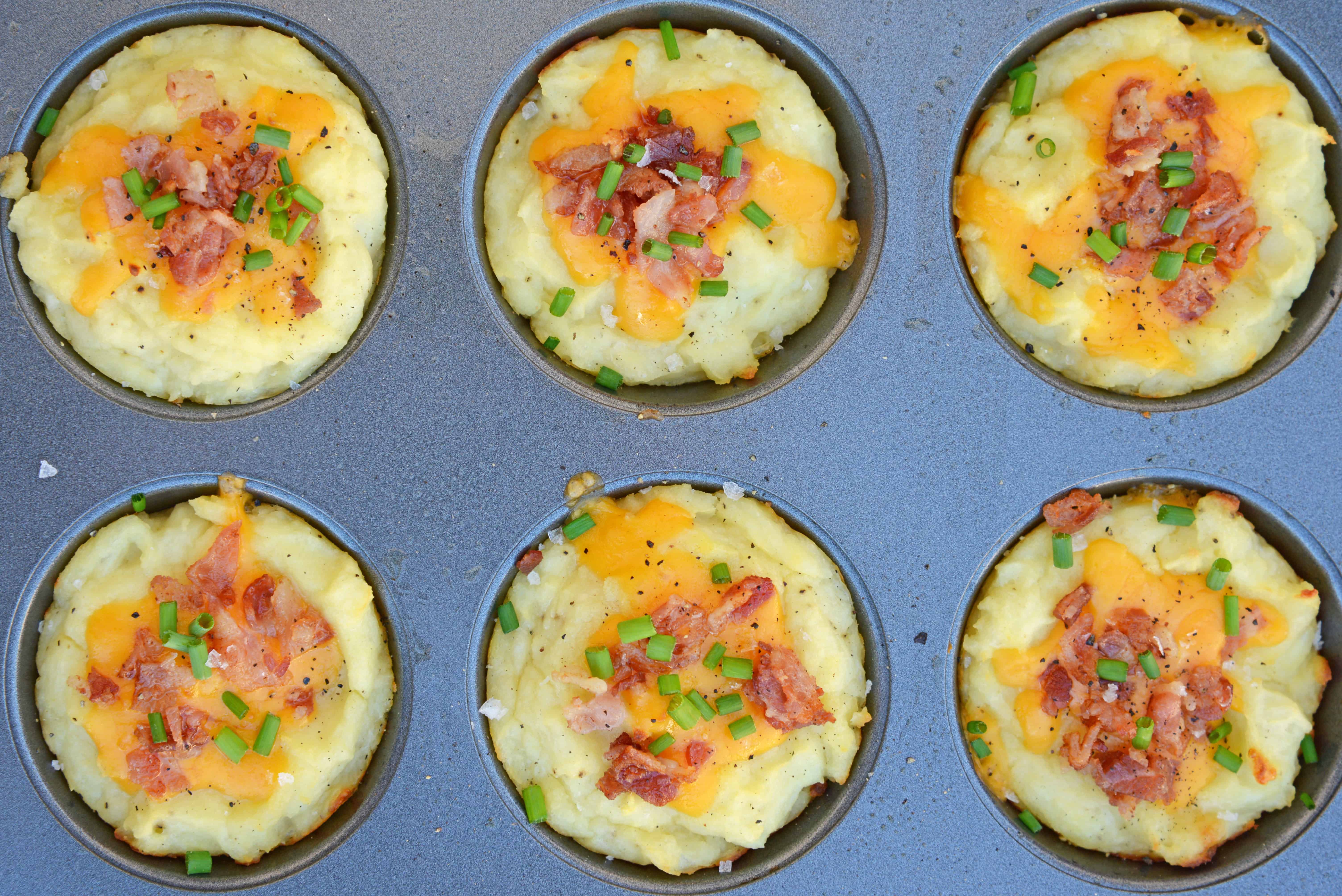 Loaded Mashed Potato Cups are the best way to use leftover mashed potatoes. Mixed with cheese, eggs and a few other ingredients, you load them into a muffin tin and poof, you've got finger food mashed potatoes! #mashedpotatoes #mashedpotatocups www.savoryexperiments.com 